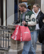 Men Begin Xmas Shopping on Christmas Eve