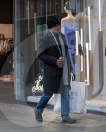 Men Begin Xmas Shopping on Christmas Eve