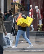 Men Begin Xmas Shopping on Christmas Eve