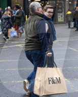 Men Begin Xmas Shopping on Christmas Eve