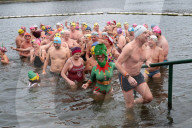 Members of the Serpentine Swimming Club participate in the annual Christmas Day morning Peter Pan Cup on the Serpentine, Hyde Park, London, Great Britain 
25th December 2024