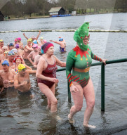 Members of the Serpentine Swimming Club participate in the annual Christmas Day morning Peter Pan Cup on the Serpentine, Hyde Park, London, Great Britain 
25th December 2024