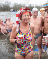 Members of the Serpentine Swimming Club participate in the annual Christmas Day morning Peter Pan Cup on the Serpentine, Hyde Park, London, Great Britain 
25th December 2024