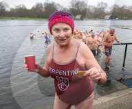 Members of the Serpentine Swimming Club participate in the annual Christmas Day morning Peter Pan Cup on the Serpentine, Hyde Park, London, Great Britain 
25th December 2024