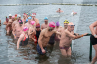 Members of the Serpentine Swimming Club participate in the annual Christmas Day morning Peter Pan Cup on the Serpentine, Hyde Park, London, Great Britain 
25th December 2024