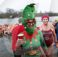 Members of the Serpentine Swimming Club participate in the annual Christmas Day morning Peter Pan Cup on the Serpentine, Hyde Park, London, Great Britain 
25th December 2024