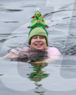 Members of the Serpentine Swimming Club participate in the annual Christmas Day morning Peter Pan Cup on the Serpentine, Hyde Park, London, Great Britain 
25th December 2024