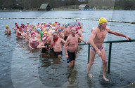 Members of the Serpentine Swimming Club participate in the annual Christmas Day morning Peter Pan Cup on the Serpentine, Hyde Park, London, Great Britain 
25th December 2024