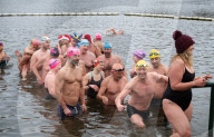 Members of the Serpentine Swimming Club participate in the annual Christmas Day morning Peter Pan Cup on the Serpentine, Hyde Park, London, Great Britain 
25th December 2024