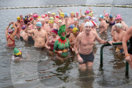 Members of the Serpentine Swimming Club participate in the annual Christmas Day morning Peter Pan Cup on the Serpentine, Hyde Park, London, Great Britain 
25th December 2024