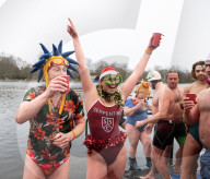 Members of the Serpentine Swimming Club participate in the annual Christmas Day morning Peter Pan Cup on the Serpentine, Hyde Park, London, Great Britain 
25th December 2024