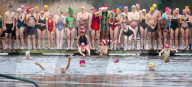 Members of the Serpentine Swimming Club participate in the annual Christmas Day morning Peter Pan Cup on the Serpentine, Hyde Park, London, Great Britain 
25th December 2024