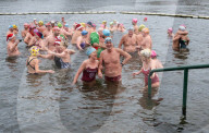Members of the Serpentine Swimming Club participate in the annual Christmas Day morning Peter Pan Cup on the Serpentine, Hyde Park, London, Great Britain 
25th December 2024