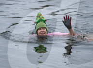 Members of the Serpentine Swimming Club participate in the annual Christmas Day morning Peter Pan Cup on the Serpentine, Hyde Park, London, Great Britain 
25th December 2024