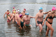 Members of the Serpentine Swimming Club participate in the annual Christmas Day morning Peter Pan Cup on the Serpentine, Hyde Park, London, Great Britain 
25th December 2024