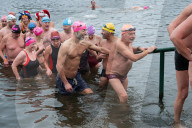 Members of the Serpentine Swimming Club participate in the annual Christmas Day morning Peter Pan Cup on the Serpentine, Hyde Park, London, Great Britain 
25th December 2024