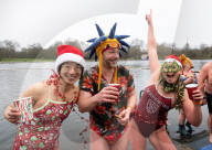Members of the Serpentine Swimming Club participate in the annual Christmas Day morning Peter Pan Cup on the Serpentine, Hyde Park, London, Great Britain 
25th December 2024