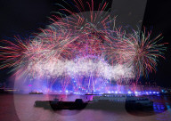 25th Anniversary of London’s New Year’s Eve fireworks display as seen from the RAF Memorial on the Embankment overlooking the river Thames towards the Coca-cola London Eye. 
31st December 2024