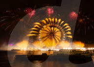 25th Anniversary of London’s New Year’s Eve fireworks display as seen from the RAF Memorial on the Embankment overlooking the river Thames towards the Coca-cola London Eye. 
31st December 2024