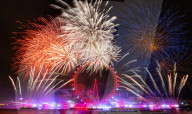 25th Anniversary of London’s New Year’s Eve fireworks display as seen from the RAF Memorial on the Embankment overlooking the river Thames towards the Coca-cola London Eye. 
31st December 2024
