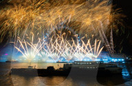 25th Anniversary of London’s New Year’s Eve fireworks display as seen from the RAF Memorial on the Embankment overlooking the river Thames towards the Coca-cola London Eye. 
31st December 2024