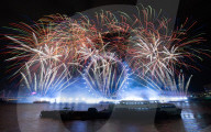 25th Anniversary of London’s New Year’s Eve fireworks display as seen from the RAF Memorial on the Embankment overlooking the river Thames towards the Coca-cola London Eye. 
31st December 2024