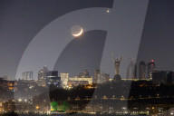 Moon and Venus meet in night sky over Kyiv