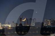 Moon and Venus meet in night sky over Kyiv