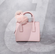 Bag riding robot behaves like a bashful baby