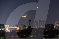 Moon and Venus meet in night sky over Kyiv