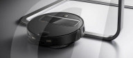 Robot vacuum cleaner has arm for picking up old socks and tissues