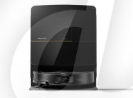 Robot vacuum cleaner has arm for picking up old socks and tissues