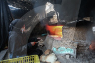 Gaza refugees in shelters during harsh winter