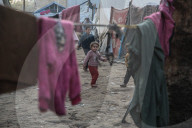 Gaza refugees in shelters during harsh winter