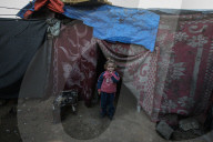 Gaza refugees in shelters during harsh winter