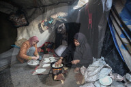Gaza refugees in shelters during harsh winter