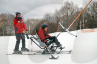 Ukrainian war veterans visit adaptive skiing training session in Kyiv