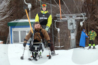 Ukrainian war veterans visit adaptive skiing training session in Kyiv