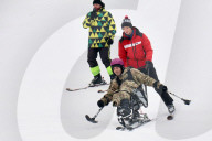 Ukrainian war veterans visit adaptive skiing training session in Kyiv