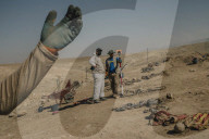 Uncovering Iraq's mass graves: the painstaking search for missing loved ones.