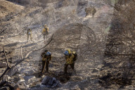Firefighters battle Los Angeles area wildfires