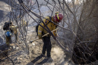 Firefighters battle Los Angeles area wildfires