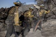 Firefighters battle Los Angeles area wildfires