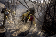Firefighters battle Los Angeles area wildfires