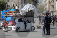 Displaced Gaza refugees heading home