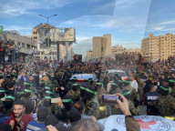 Palestinians view handover of Israeli hostages to ICRC