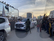 Palestinians view handover of Israeli hostages to ICRC
