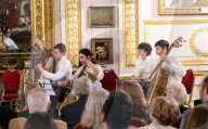 Concert of the Orchestra of Recycled Instruments and Cateura at Lancaster House, London, UK.