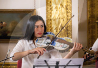 Concert of the Orchestra of Recycled Instruments and Cateura at Lancaster House, London, UK.