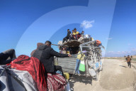 Displaced Gazans cross Netzarim corridor into Gaza City